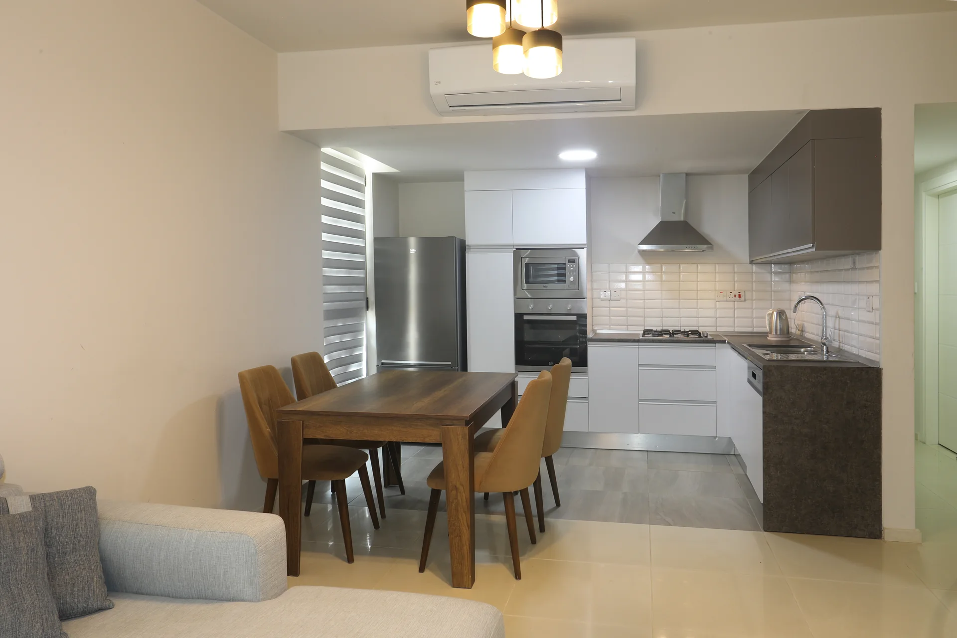 Kitchen and dining area in an Abelia apartment