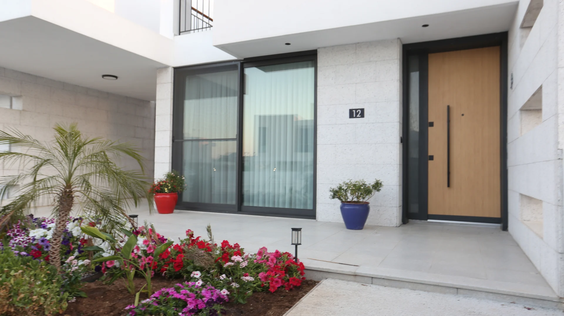 Front door of an Azure villa with planting