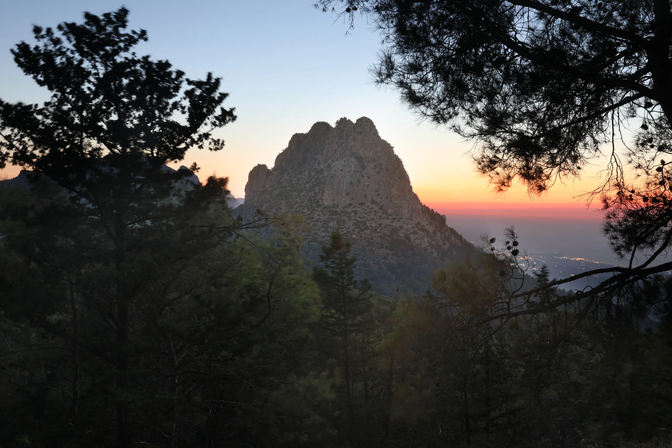 A peak in the Kyrenia range at sunset, with the Mediterranean beyond